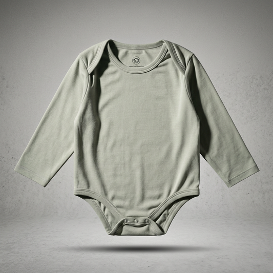 A green Heavyweight Bamboo Baby Body - Big Fit Energy, a long-sleeved bodysuit with snap closures, on a neutral background.